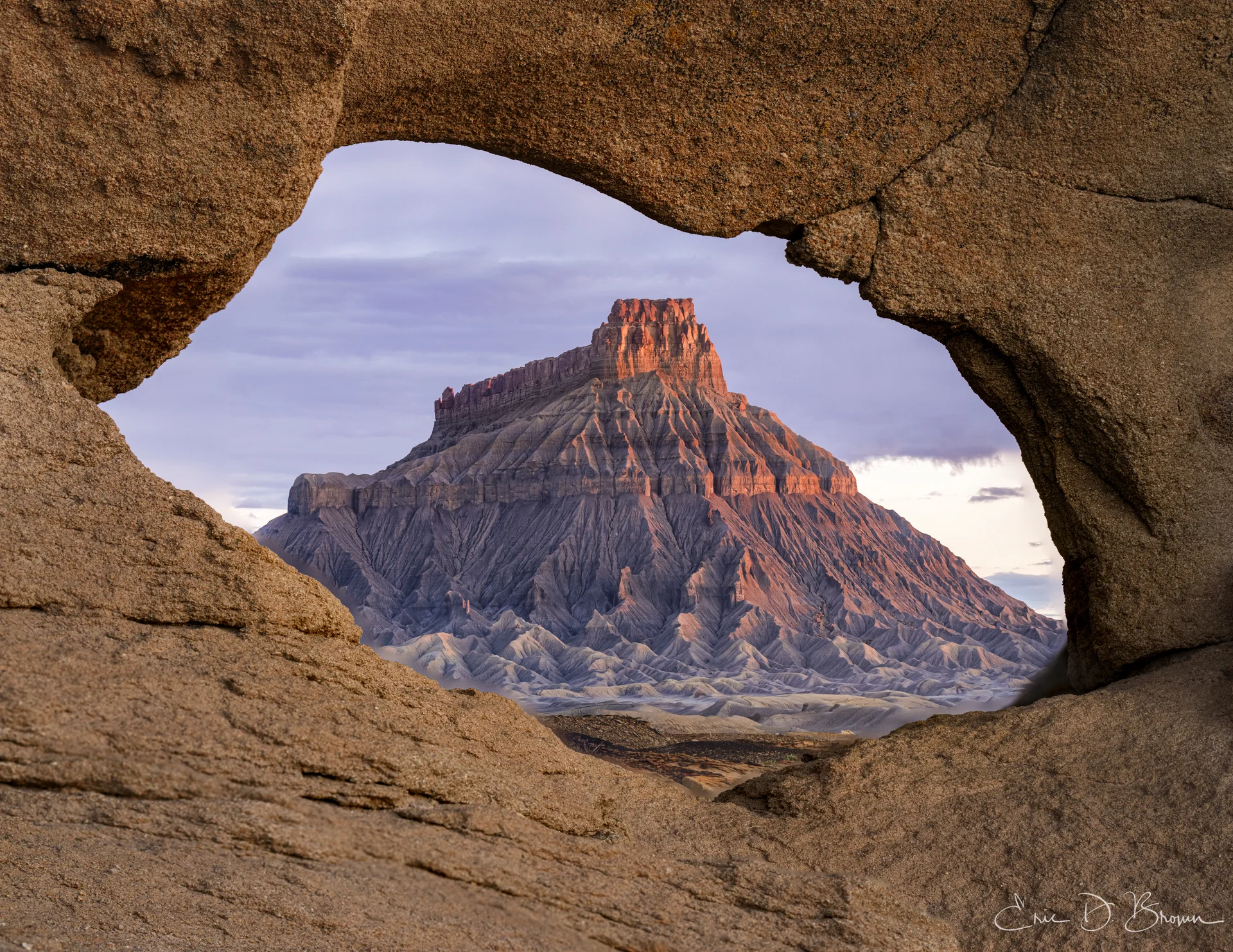 Nature's Frame: Factory Butte Through Stone Window