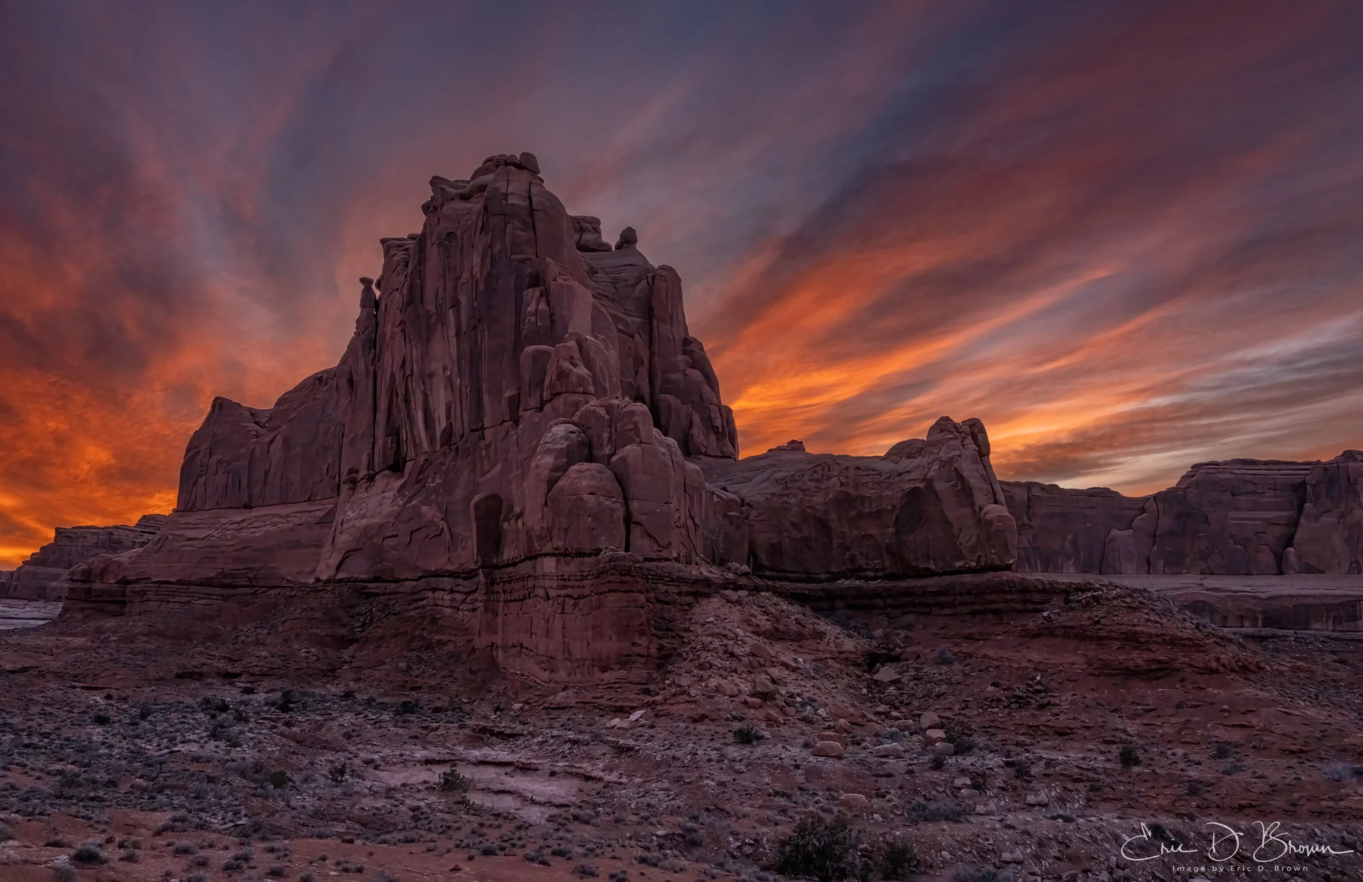 Fiery Skies Over Arches National Park at Sunset