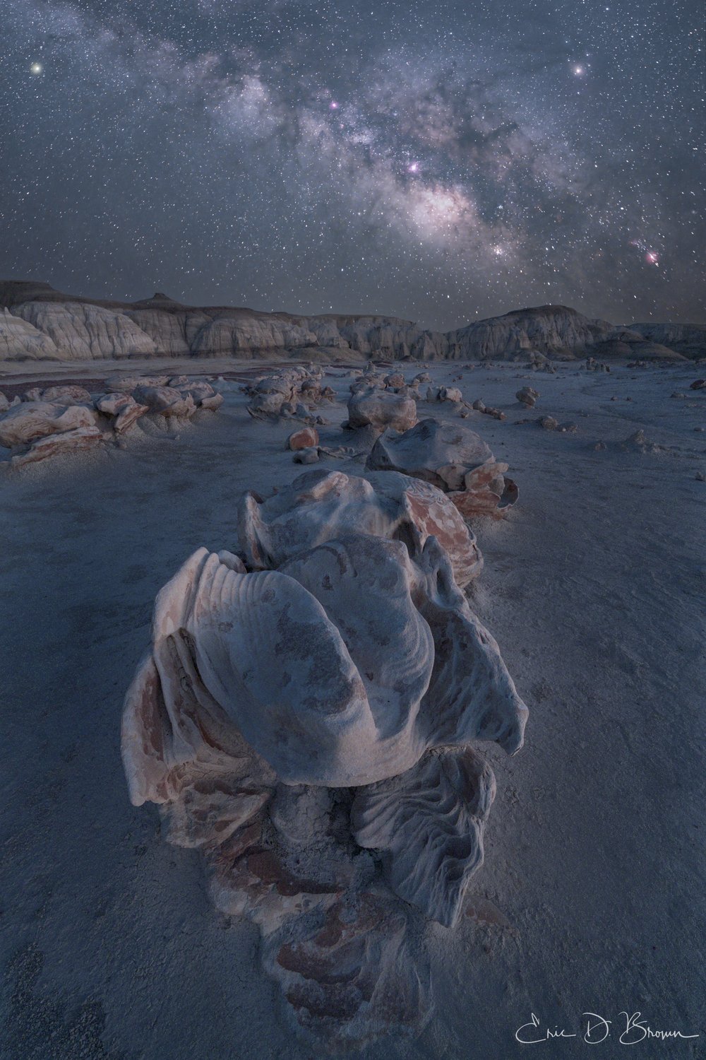 Alien Eggs at Bisti Badlands, New Mexico -  The alien eggs, sometimes called the cracked eggs, at the Bisti/De-Na-Zin Wilderness south of Farmington, New Mexico. A cluster of rounded, cracked stone formations on the open desert floor at the end of a trail-less hike through the badlands.